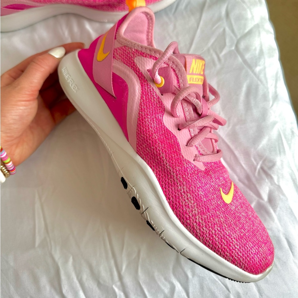 Nike Flex trainers in Hot Pink